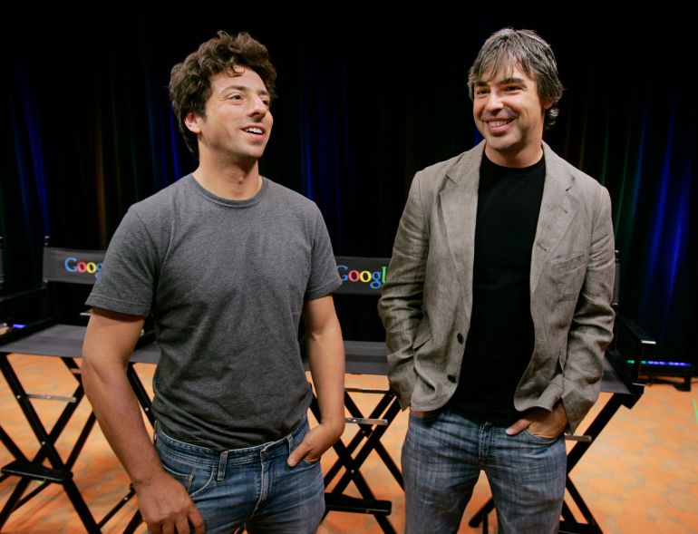 FILE - In this Sept. 2, 2008 file photo, Google co-founders Sergey Brin, left, and Larry Page talk during a new conference at Google Inc. headquarters in Mountain View, Calif. Twenty years after Page and Brin set out to organize all of the internet’s information, the search engine they named Google has morphed into a dominating force in smartphones, online video, email, maps and much more. (AP Photo/Paul Sakuma, File)